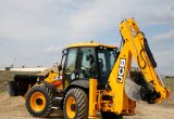 Услуги экскаватора-погрузчика JCB цена час аренды