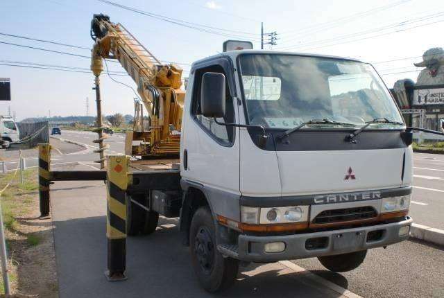 Mitsubishi Canter автобуровая Aichi D502 1999г
