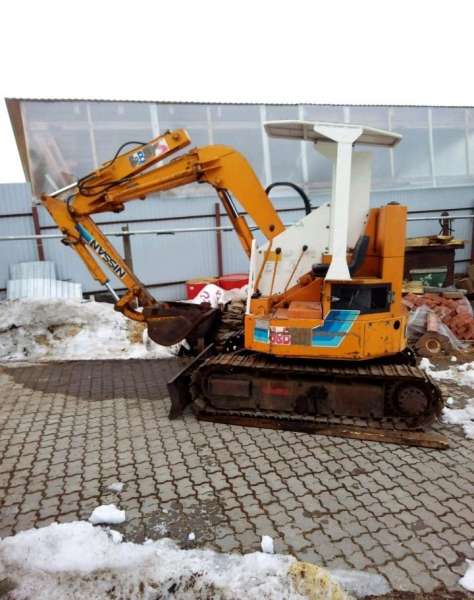 Эскаватор Nissan sb15