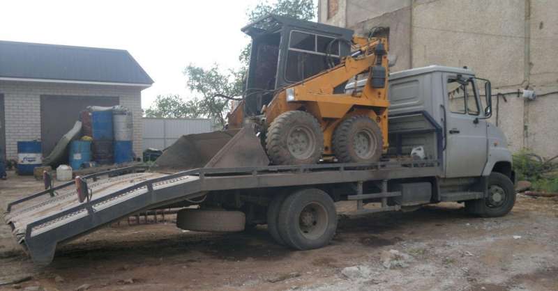 Погрузчик (ямобур) UNC 060+ эвакуатор бычок