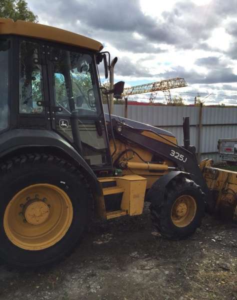 Продам экскаватор погрузчик John Deere 2012 год