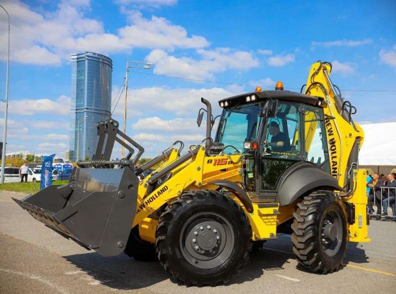 Нев холланд экскаватор погрузчик. Экскаватор-погрузчик New Holland b115b. Экскаватор-погрузчик New Holland b115.