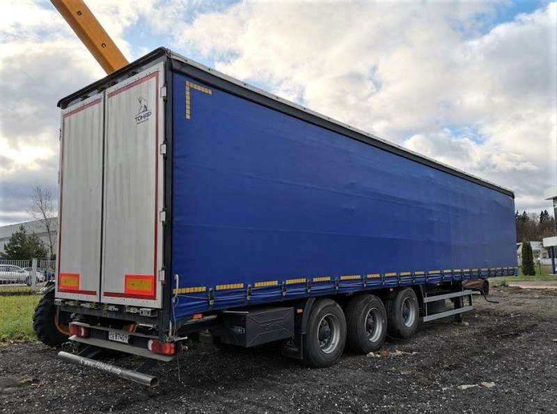 Шторно-бортовой полуприцеп Тонар 9746