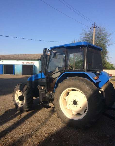 New Holland (Нью Холланд) TL 5060