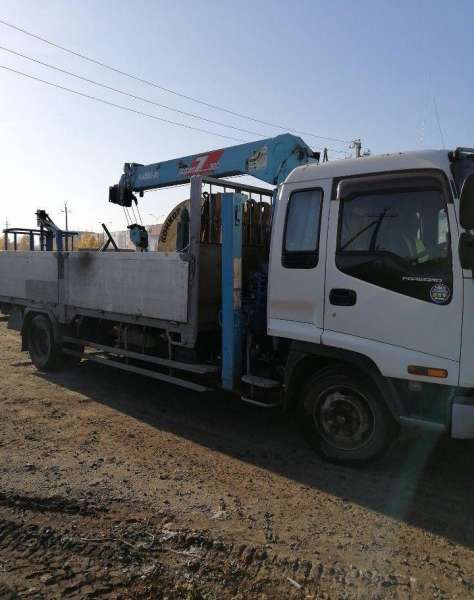 Аренда манипулятора стрела 12 метров.Спецтехника