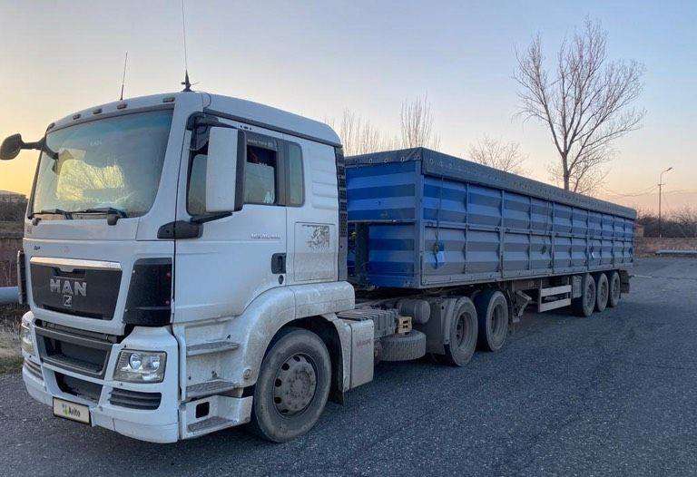 MAN TGS 26.440 с полуприцепом, 2012