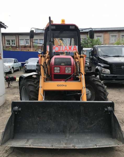 Экскаватор-погрузчик амкодор 702ем-03