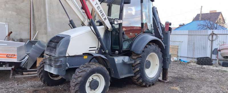 Экскаватор-погрузчик Terex TLB825, 2014