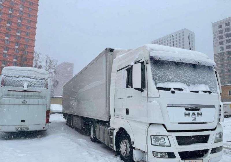 MAN TGX 18.480 с полуприцепом, 2009