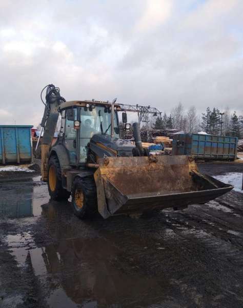 Экскаватор-погрузчик John deere 325K 2012 7000 м.ч