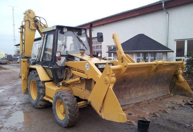 Экскаватор-погрузчик сат438В