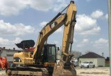 Гусеничный экскаватор Caterpillar 324D 2010 в Москве