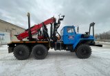 Лесовозный тягач Урал с манипулятором