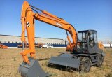 Колесный Полноповоротный Экскаватор E140W в Москве