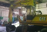 Экскаватор колёсный Caterpillar Z216