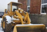 Погрузчик-экскаватор UN-053 в Воркуте